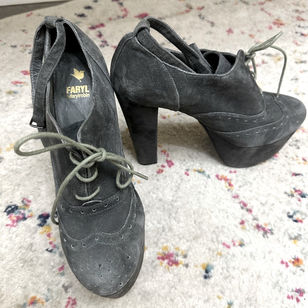 Farylbyrobin booties with ankle strap and lace up.